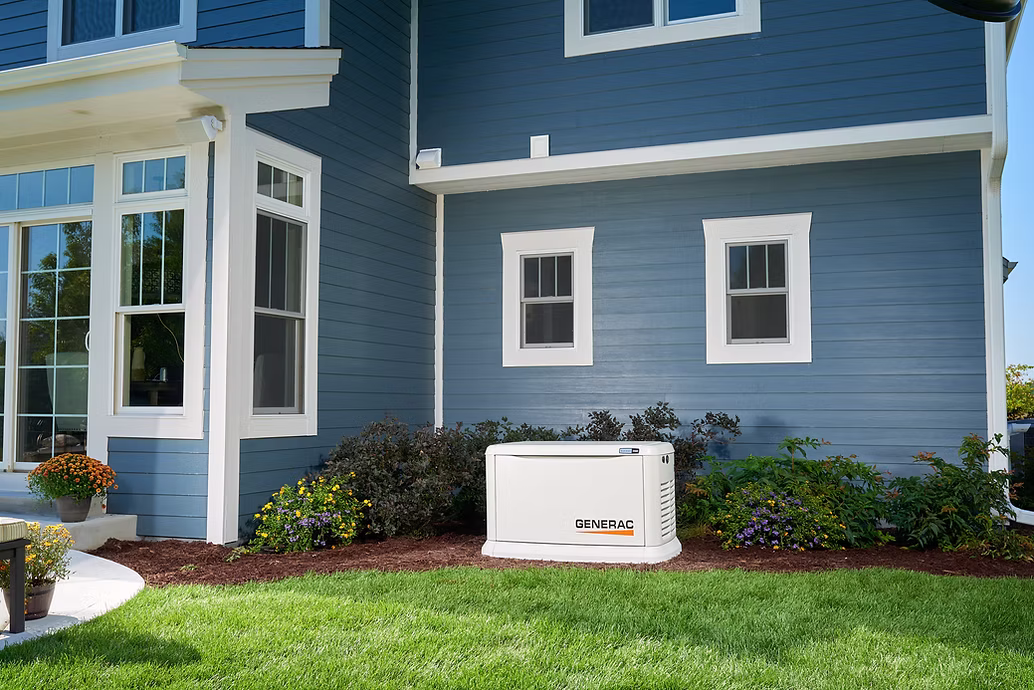 A Generac Generator installed on the side of a house